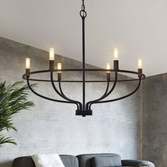 Bring a farmhouse vibe to your living or dining room with this chandelier with its open, lively silhouette and metal finish. It's made from metal and is inspired by wagon wheels. Hanging within the frame is a stylish candle holder, not including the exposed 60W bulb, that will wash your space in a warm glow. This light fixture is compatible with dimmer switches. (not included) YANSUN 6-Light Black Modern/Contemporary Led Chandelier | L-DZ143B(N1) Black Iron Light Fixtures, Vintage Kitchen Light Fixtures, Chandelier Vaulted Ceiling, Vaulted Ceiling Chandelier, Living Room Chandelier High Ceiling, Black Dining Chandelier, Great Room Chandelier, Modern Farmhouse Lighting Dining Room, Pendant Chandelier Dining Room