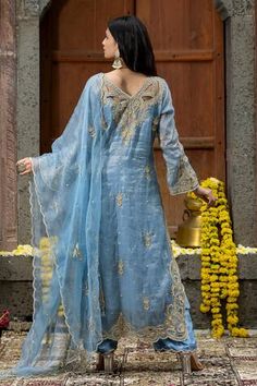 Blue kurta with thread embroidered floral vine motifs, embellished by beads, cutwork and scalloped border. Comes with palazzo and scallop border dupatta. - Aza Fashions Blue Slub Silk Kurta With Sheer Dupatta, Unstitched Blue Tissue Silk Kurta, Blue Resham Embroidered Kurta In Tissue Silk, Blue Resham Embroidered Tissue Silk Kurta, Blue Tissue Silk Kurta With Resham Embroidery, Blue Tissue Silk Kurta With Dupatta, Blue Bollywood Tissue Silk Kurta, Blue Silk Palazzo Set With Intricate Embroidery, Blue Chikankari Embroidery Palazzo Set For Reception