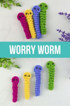 colorful crocheted worms with the words worry worm written in white and blue