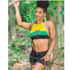 High neck jamaican crop top. 100% acrylic. Summer High Neck Halter Top For Beach, Stretch Cropped Top For Beach, Stretch Cropped Crop Top For Beach, Stretch Crop Top For The Beach, Green High Neck Top For Summer, High Neck Green Top For Summer, Green High Neck Summer Top, Stretch Festival Crop Halter Top, Stretch Halter Crop Top For Festival