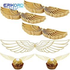 four golden wings and two gold vases on a white background, each with an ornate design in the middle