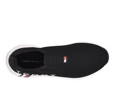 Lightweight and breathable fabric upper,Easy slip-on entry,Classic round toe,Cushioned EVA insole,Durable synthetic outsole,Tommy Hilfiger® branding details | Women's Tommy Hilfiger Aliah Sneakers in Black Size 5 Medium Shoe Carnival, Tommy Hilfiger Women, Slip On Sneakers, Sneakers Black, Breathable Fabric, Womens Sneakers, Tommy Hilfiger, Slip On, Size 7