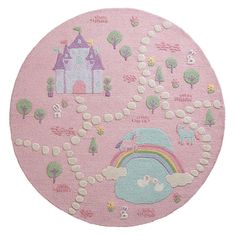 a pink rug with princess castle and rainbows on it