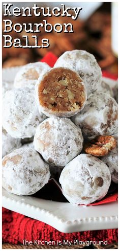 kentucky bourbon balls are piled on top of each other in a white plate with text overlay