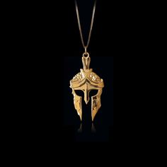 Channel the warrior spirit with our gold Spartan helmet pendant, meticulously crafted in the USA. Symbolizing strength, honor, and valor, these pieces are designed for those who embody the fearless spirit of a Spartan. PENDANT INFORMATIONThis pendant is made of real, solid gold.• Made in USA• Material: 14k or 18k solid gold• Finish: polished• Height: 1.5" (38 mm) x Width: 0.8" (19,5 mm)• Pendant weight: approx. 6 grams (14k)• Bail: fits up to 4 mm chains• Solid back, not hollow• A certificate of Warrior Style Gold Necklaces As Gift, Gold Viking Style Necklace For Gift, Phoenix Pendant, Spartan Helmet, Inner Warrior, Historical Jewellery, Warrior Spirit, Gold Dragon, Small Circle