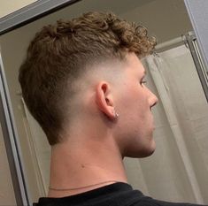 Clean Fades Men, Mullet Hairstyle Mens Short Hair, Subtle Mohawk Men, Mulet Hair Men Short, Short Faux Hawk Men Fade, Low Skin Fade Curly Hair, Modern Mullet For Men With Straight Hair, Men’s Mohawk Fade, Modern Mohawk For Women