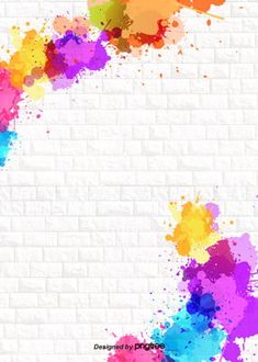 colorful paint splattered on a white brick wall