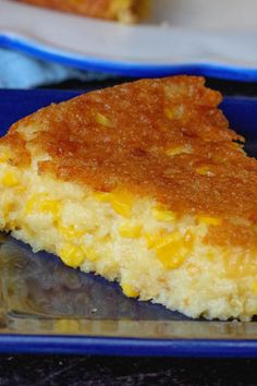 a piece of cornbread on a blue plate