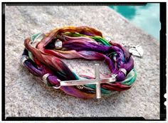 Silver Cross Wrap Bracelet with Artistic Pallet Sari Silk. Colorful Silk with Silver accent beads and Connectors. *Custom Orders Welcome* Gift Box, Extras, etc... May be purchased in the Ala Carte Listing. https://www.etsy.com/listing/286913011/ala-carte-ordersadd-onsextras-stainless Silk Wrap Bracelets, Zodiac Rings, Sari Silk, Welcome Gifts, Silk Wrap, Ring Photos, Gold Cross, Religious Gifts, Braided Bracelets