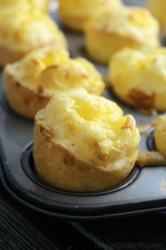 mini cheese muffins on a baking tray ready to be baked in the oven