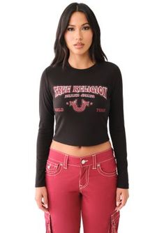 The Long Sleeve Logo Baby Tee is a true throwback. Designed from comfy stretch cotton, this long-sleeved women's t-shirt features a crewneck and slim fit. Finished with a logo graphic across the front and cropped hem. | True Religion Women's Long Sleeve Logo Baby T-Shirt, Black, Medium Western Logo, Logo Baby, Sports Blazer, Women Long Sleeve Tops, Under Dress, Baby T Shirt, Plus Dresses, Pant Shirt, Donna Karan