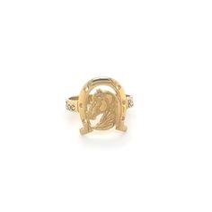 a gold ring with an image of a horse on it