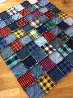 a patchwork rug made out of old jeans