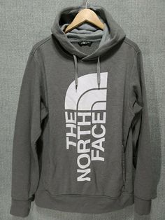 The North Face Men's Hoodie Graphic Big Logo Size Medium Gray   Size: Medium   Actual Measurements:                                   - Armpit to Armpit: 24”                                                   - Neck to Front Hem: 27”   - Back Neck to Bottom Hem: 29”   - Neck Hem to Cuff Hem: 32”   - Shoulder Hem to Cuff Hem: 28“   Color: Gray Features:Bottom of Form ·       Hood with drawstring ·       Front pouch pocket Condition: This hoodie has some minor pilling. Please see pictures for detai Gray Cotton Logo Sweatshirt, Gray Long Sleeve Logo Sweatshirt, Gray Logo Sweatshirt For Streetwear, The North Face Sweatshirt For Streetwear In Fall, The North Face Sweatshirt For Fall Streetwear, The North Face Fall Streetwear Sweatshirt, The North Face Sports Sweatshirt For Winter, Outdoor Hoodie Sweatshirt With Logo Print, The North Face Winter Sweatshirt