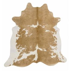 a brown and white cowhide rug on a white background