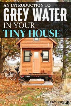 an image of a tiny house in the woods with text overlay that reads an instruction to grey water in your tiny house