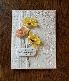 a close up of a card with flowers on it