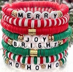 christmas bracelets are stacked on top of each other