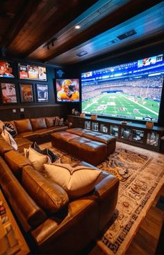 a living room with couches and televisions in the wall mounted on the walls