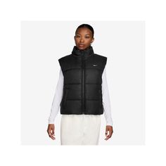 Step up your casual looks with this stylish women's Nike Sportswear classic puffer therma-fit loose vest.Click on this WOMEN'S GUIDE to find the perfect fit and more! Step up your casual looks with this stylish women's Nike Sportswear classic puffer therma-fit loose vest.Click on this WOMEN'S GUIDE to find the perfect fit and more! TECHNOLOGIES & FEATURES Nike Therma-FIT technology helps manage your body's natural heat to help keep you warm in cold-weather conditions Water-repellent finish helps Nike Casual Sports Puffer Jacket, Nike Casual Spring Puffer Jacket, Casual Nike Black Puffer Jacket, Casual Black Nike Puffer Jacket, Nike Casual Black Puffer Jacket, Nike Streetwear Puffer Jacket, Sporty Winter Vest, Casual Puffer Vest For Streetwear, Casual Sleeveless Puffer Jacket For Cold Weather