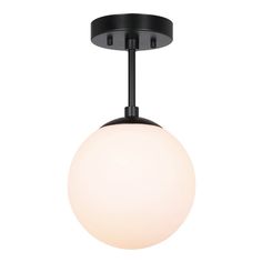 a black and white light fixture with a glass ball on the top, hanging from a ceiling