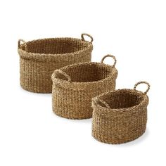 three woven baskets with handles and handles