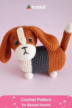 a crochet dog is standing on its hind legs with the words, crochet pattern for basset hound