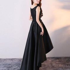 Black Satin and Lace Round Neckline.. Black Sleeveless Satin Prom Dress, Black A-line Satin Evening Dress, Black Dress With Sweep Train For Party Season, Black Satin Dress For Night Out During Prom Season, Black Satin Prom Gown, Black Satin Evening Dress For Prom, Black Satin Evening Dress For Party Season, Black Satin Gown For Prom Season, Black Sleeveless Satin Dress For Wedding