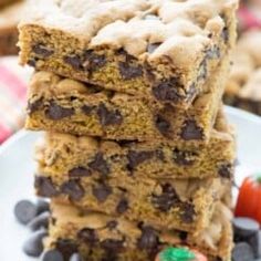 chocolate chip cookie bars stacked on top of each other with m & m candies