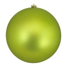 a green christmas ornament on a white background