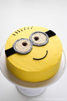 a yellow cake with two eyes on it