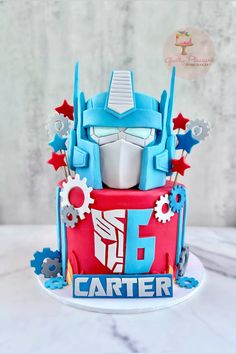 a birthday cake made to look like a robot from the movie's tv series