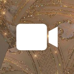 an abstract background with gold and white designs on the top right corner, surrounded by sparkles