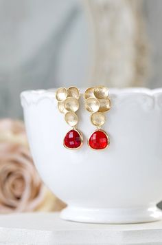 "These are beautiful and unique red and gold post earrings. Sparkly ruby red glass crystals are faceted and gold framed. Textured gold bubbles are matte gold plated over brass with sterling silver ear posts that are great for sensitive ears. These earrings are perfect for a romantic night out or a gold and red themed wedding. Glass crystals can be changed to different colors upon your request. ♥ Measurement & Details: Total length: approx. 1.5\" (37mm) ruby red glass crystal: 13mm x 15mm Ear Teardrop Pearl Earrings, Gold Bubbles, Ivory Earrings, Crystal Dangle Earrings, Vintage Style Jewellery, Ivory Pearl, Gold Filigree, July Birthstone, Crystal Drop Earrings