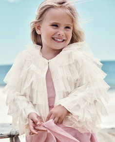 Dance-ready jacket made with the prettiest ruffle tulle and fully lined in combed cotton voile. Wear all day, from pirouettes to play.

Model is 3'6" and is wearing size s—all styles designed for an extra year of growth
Elegant tiered ruffle overlay made with recycled tulle
Fully lined in ultrasoft combed cotton voile
Machine washable tulle
OEKO-TEX® STANDARD 100 certified safe from hundreds of harsh chemicals Luxury Lifestyle Dreams, Sleeve Jacket, Cotton Voile, Combed Cotton, Chemicals, To Play, Girl Outfits