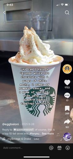 the starbucks coffee cup has whipped cream in it