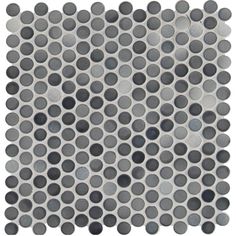 a gray and white tile with circles on it