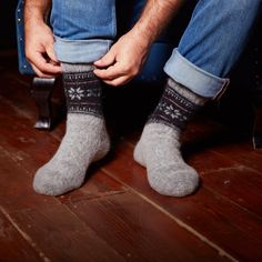 Man's legs posing wearing jeans and grey sheep wool socks relaxed fit with a black Camp Socks, Snow Falling, Merino Wool Socks, Merino Sheep, Winter Evening, Bed Socks, Holiday Socks, Warm Bed, Winter Socks