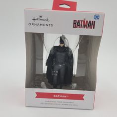 the dark knight batman action figure is in its box, and it's ready to be