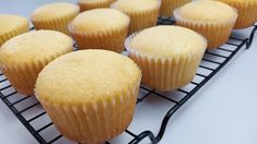 there are many muffins on the cooling rack