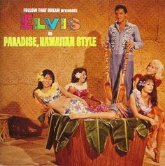 the album cover for elvis's in paradise, hawaiian style with four women sitting on a barrel