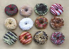 twelve different donuts with sprinkles on them