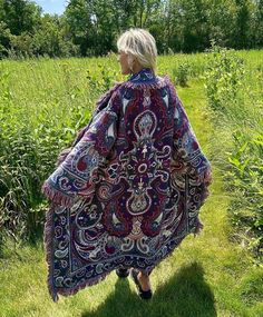 Introducing my latest creation! Upcycled two of the same gorgeous vintage blankets into this cozy, one of a kind tapestry coat.  Feautures double front pockets and toggle closure for added functionality. Perfect statement piece for breezy seaside mornings, late nights at festivals, dinner dates, or lounging around the house. This beauty is sure to turn heads wherever you may wander! Measurements: Overall length: 55" Pit to pit laying flat: 23" Shoulder seam to wrist: 22" 100% cotton. Machine wash, tumble dry on low heat. This statement jacket was made with all of my heart, for any human, anywhere, that may be attracted to its vibe! My intention is that the piece will amplify the divine nature of your inner being. ✨🌙 Tapestry Coat, Vintage Blankets, Romantic Classic, Tapestry Blanket, Dinner Dates, Blanket Coat, Statement Jacket, Divine Nature, Vintage Blanket