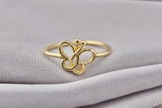 14K Solid Gold Butterfly Ring- Gold Butterfly Ring - Dainty Butterfly Ring-Fine Jewelry-Gift for Her-Gift for Best Friend-Birthday Gİft This solid gold dainty ring is made entirely from 14k solid gold. * Jewelry is packaged and shipped in a delicate jewelry gift box. * If you are purchasing it as a gift, please feel free to add a personal note. Anniversary, Gift For Wife, Christmas Gift Gold Kt: 14K solid gold * Available Gold Color:  * Guaranteed Authentic 14k Gold, NOT Plated Or Filled * Stamp Simple Gold Locket Designs, Butterfly Rings Jewelry, Butterfly Gold Ring, Minimalistic Rings, Modern Gold Ring, Gold Dainty Ring, Gold Butterfly Ring, Couple Ring Design, Dainty Butterfly