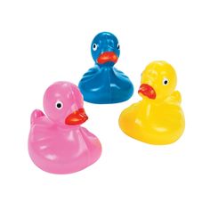 three rubber ducks sitting next to each other