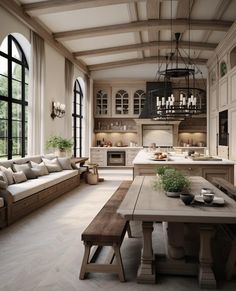 a large open kitchen and living room with wood flooring, white walls and ceiling