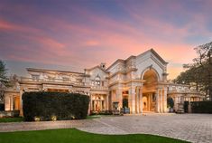 a large mansion with a massive front entrance