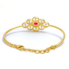 Make a statement with our Elegant Floral Diamond Bangle Bracelet. Crafted with 18k yellow gold and weighing 10.2 grams, this exquisite piece features 0.88ct F-G VS round brilliant-cut diamonds and oval-shaped cultured rubies. The adjustable 1.2" links and lobster lock ensure a comfortable fit. Let this stunning bangle take center stage in your jewelry collection. PRODUCT DETAILS Gold Purity(karat): 18k Item Weight(grams): 10.2 Item Finish: Yellow Gold Stone: Diamond Diamond Weight(carats): 0.88c Elegant 22k Gold Round Bracelet, Elegant 22k Gold Bracelet, Exquisite Oval Gold Bracelets, Yellow Gold Oval Bangle With Gemstone, Exquisite Gold Oval Bracelet, Exquisite Oval Gold Bracelet, Gold Oval Diamond Bracelet For Wedding, Gold Oval Bracelet With Cubic Zirconia, 18k Gold Bangle