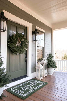 39 Modern Winter Front Porch Decor Ideas to Refresh Your Home Front Porch Decor Plants, Wrap Around Front Porch Decorating, Pathway To Front Door Entrance, Front Of House With Porch, Small Front Porch Remodel, Green Front Door Decor, Christmas Decor Outside Porch, Front Deck Ideas Entrance, Front Porch Decor Winter