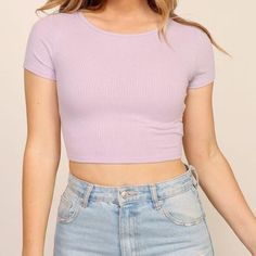 Round Neck Ribbed Knit Crop Top 55% Polyester, 45% Linen Fitted Basic Knit Top For Spring, Casual Seamless Purple Tops, Casual Purple Seamless Tops, Casual Purple Knit Top, Casual Purple Ribbed Top, Purple Ribbed Knit Tops, Lavender Sleeveless Crop Top, Purple Stretch Cotton Crop Top, Purple Crop Top With Built-in Bra For Spring